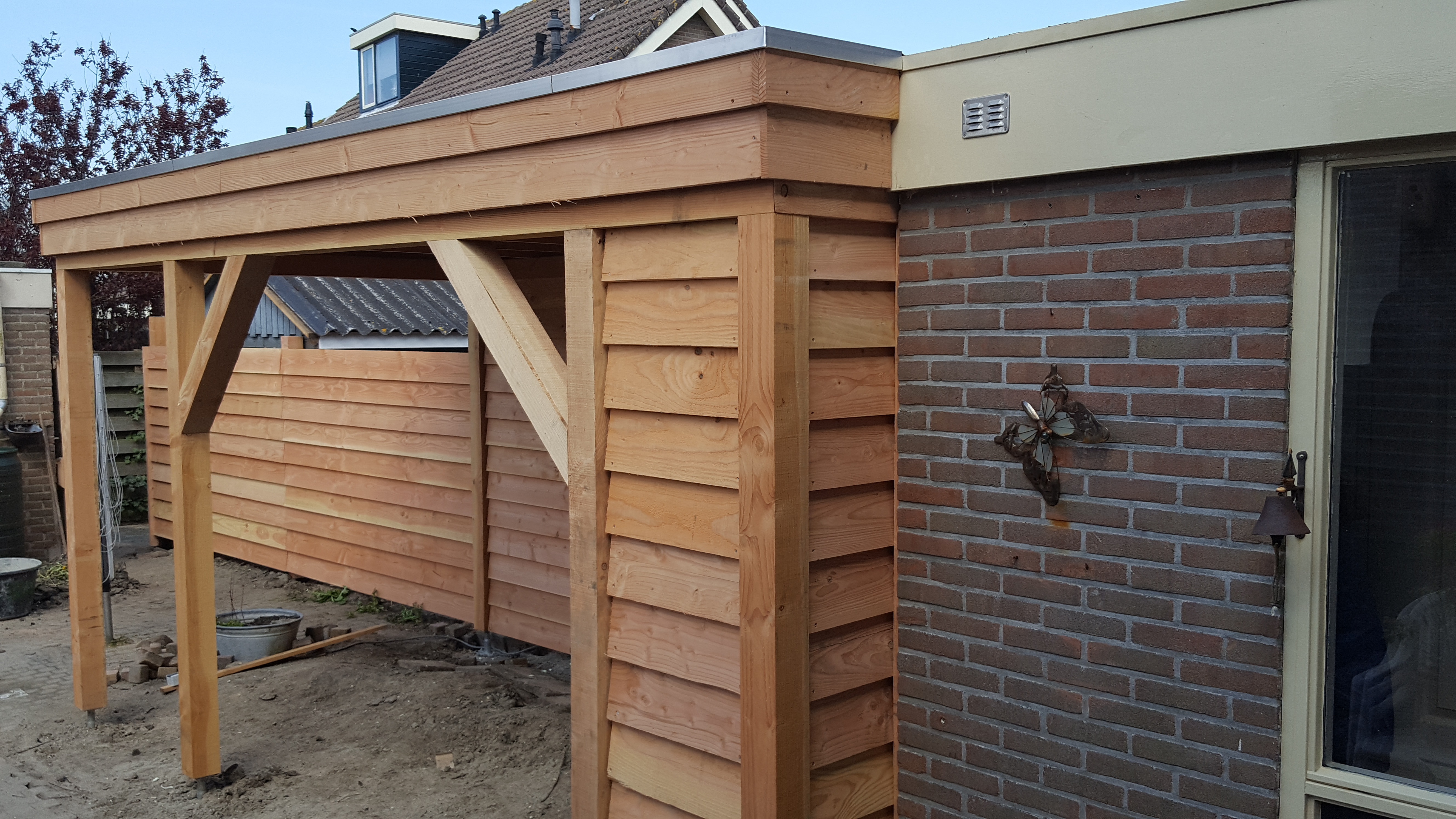 Project: Douglas veranda met schutting.